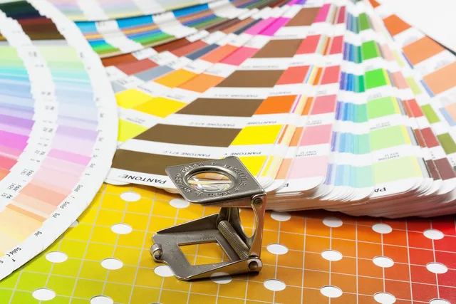 magnifying glass, color fan, pantone, printing inks, full tone, grid, four color printing, cmyk, thread counter, precision, check, proof, pigments, selection, gradient, graphic design, communication, printing house, pantone, cmyk, graphic design, printing house, printing house, printing house, printing house, printing house. How creative automation builds Cardiff's English and Welsh ads